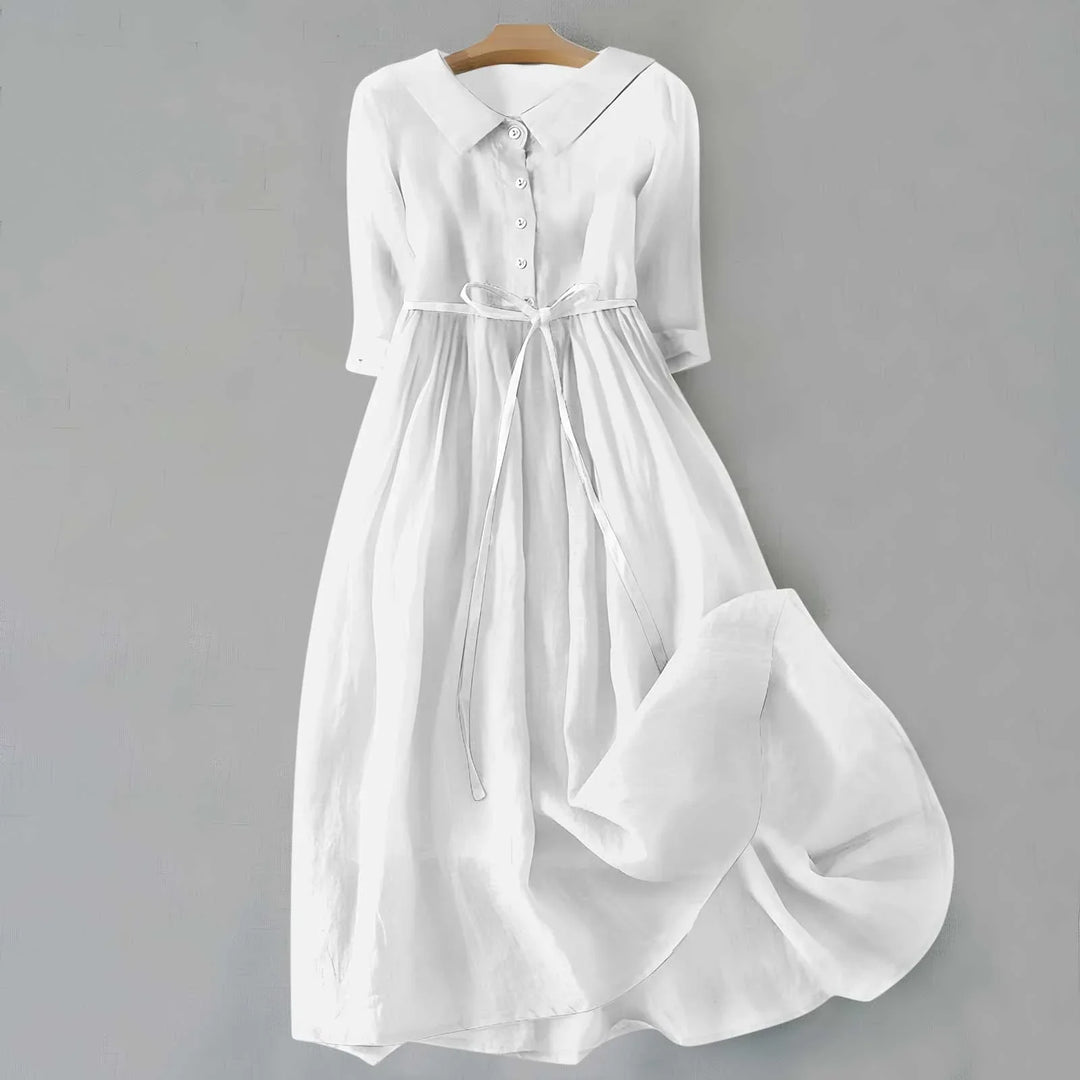 Elegant casual women's midi dress, relaxed fit, 3/4 sleeves & collar. Versatile for day to night.