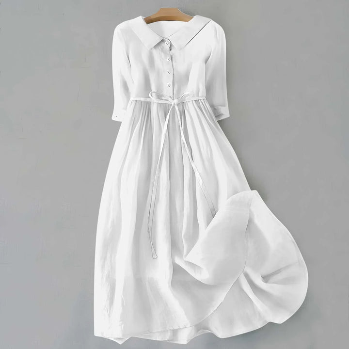 Elegant casual women's midi dress, relaxed fit, 3/4 sleeves & collar. Versatile for day to night.