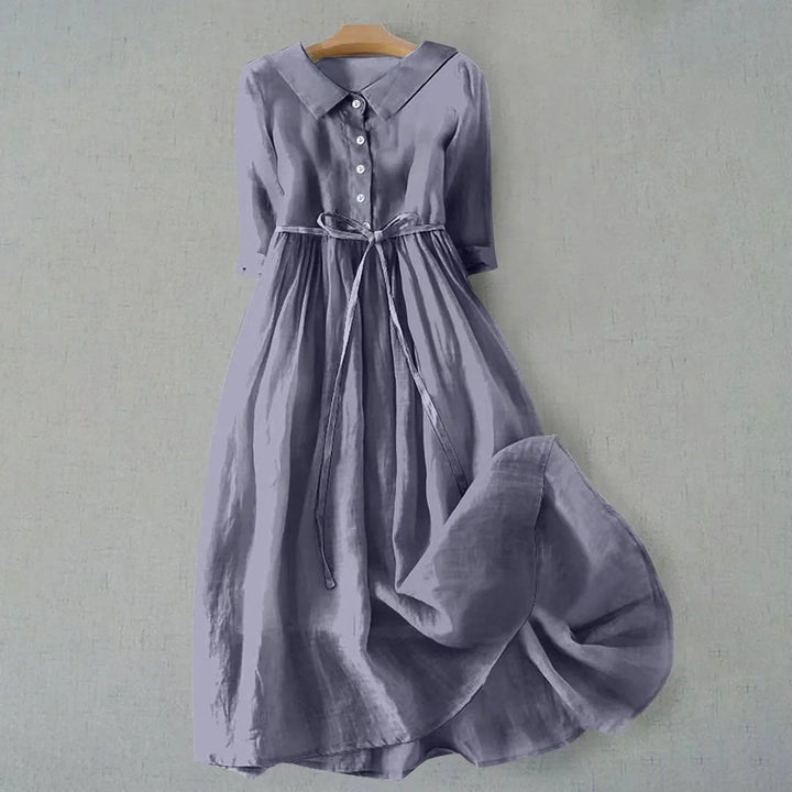 Stylish women's relaxed fit midi dress, collared, 3/4 sleeves. Comfortable and elegant for any occasion.