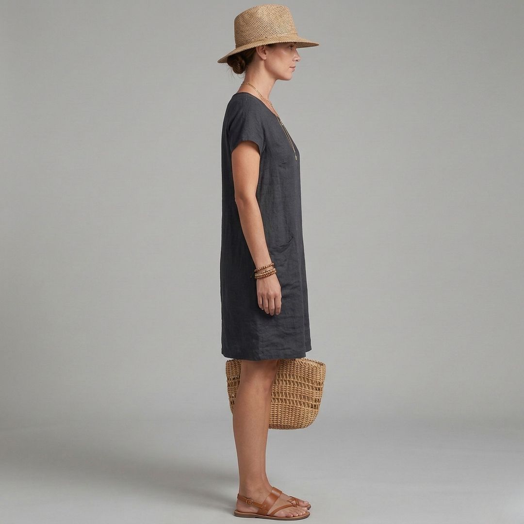 Comfortable women's mini shift dress with practical pockets. Relaxed fit for effortless style.