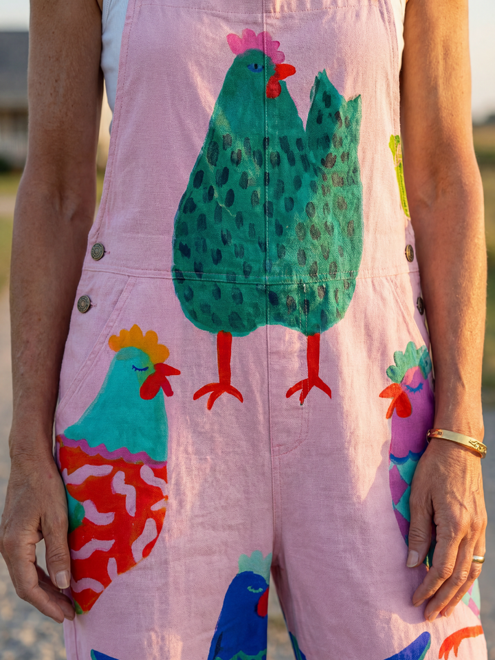 Casual women's hen motif pink jumpsuit, relaxed fit for off-duty style & summer outfits.