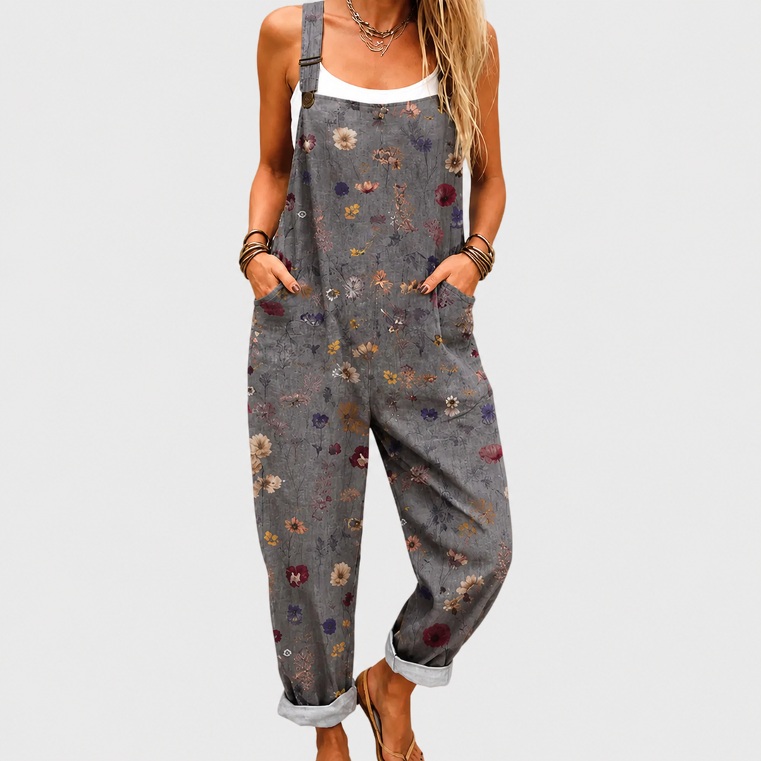Women's relaxed fit printed jumpsuit with wide leg and adjustable straps, ideal for casual summer boho style.