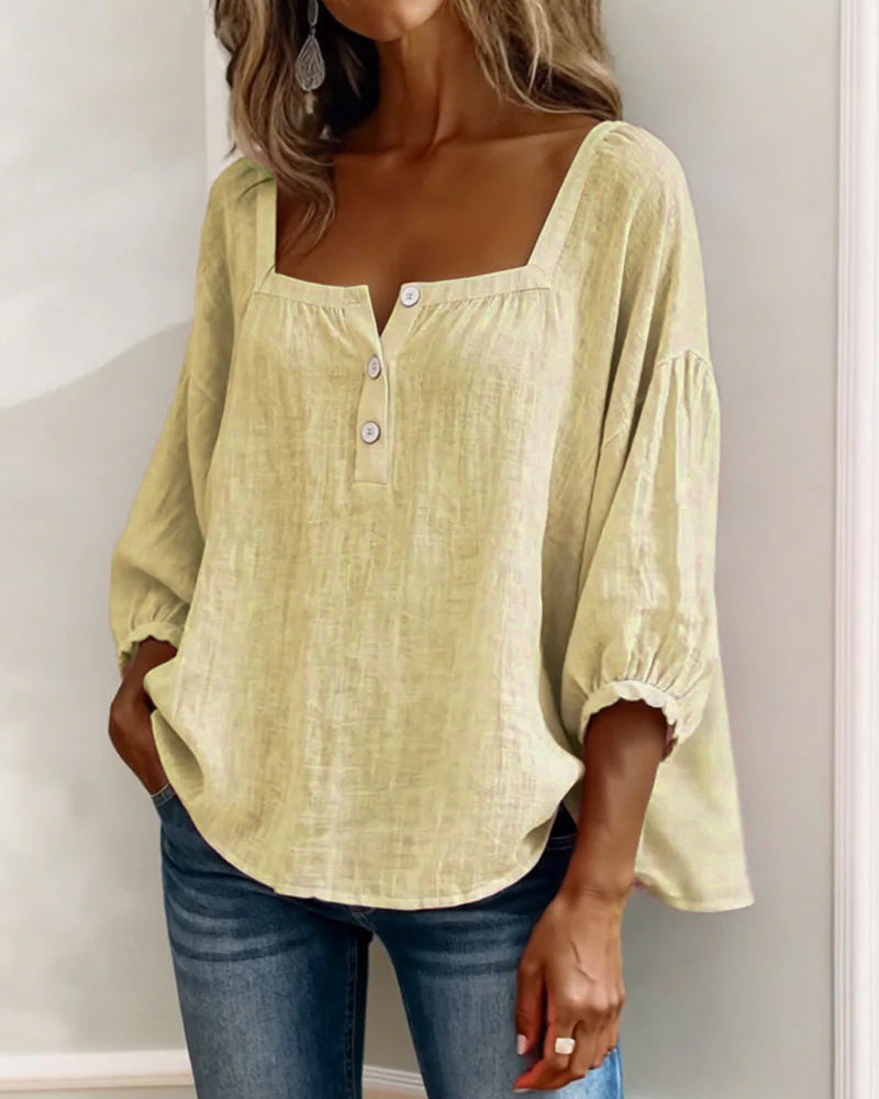 Chic women's puff sleeve top with a square neck, relaxed fit, suitable for summer fashion.