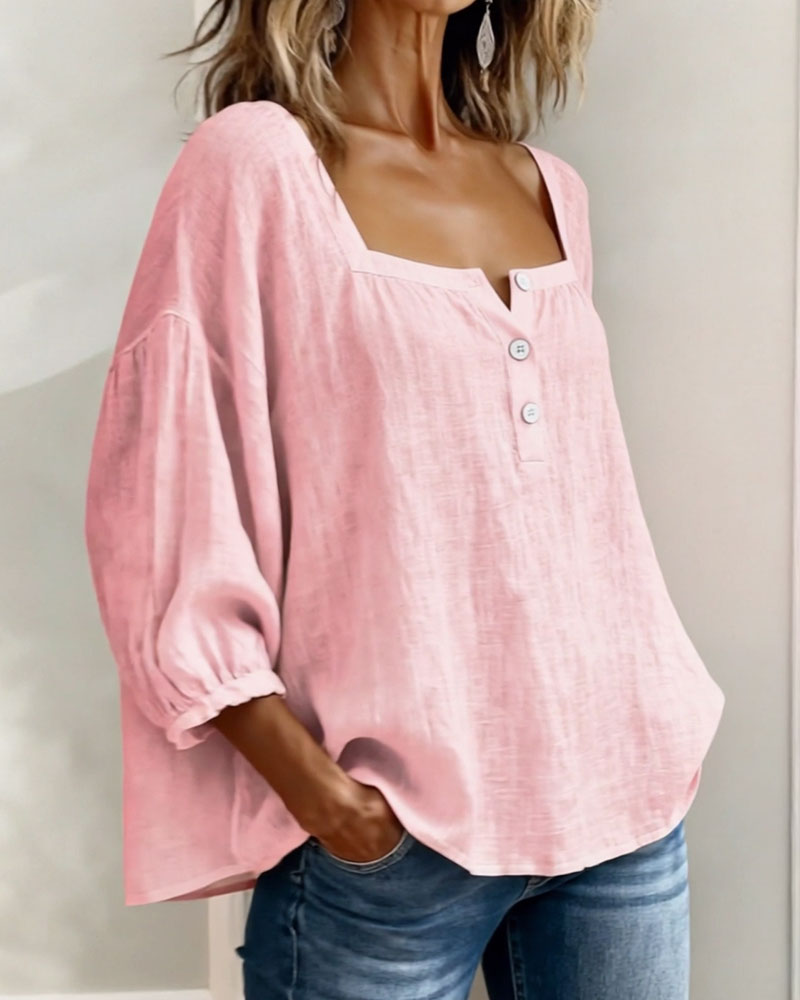 Stylish women's puff sleeve blouse, relaxed fit, square neck, and button front detail.