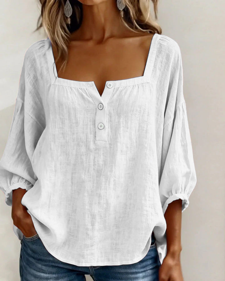 Spring fashion women's blouse, puff sleeves, square neck, button front, and comfortable fit.