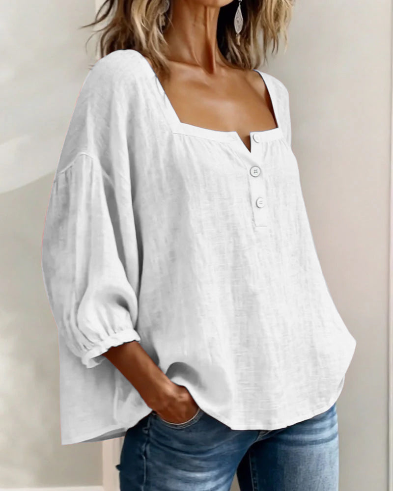Summer ready women's puff sleeve top, square neck, relaxed fit, and chic design.