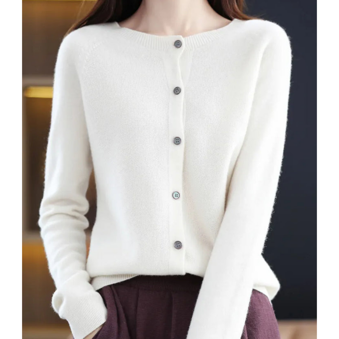 Women's long sleeve ribbed cardigan. Buttoned front, relaxed fit. Perfect for fall layers.