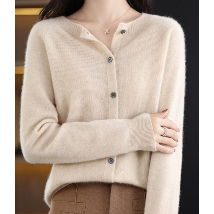 Winter essential: Women's relaxed fit ribbed knit cardigan. Comfortable button front.
