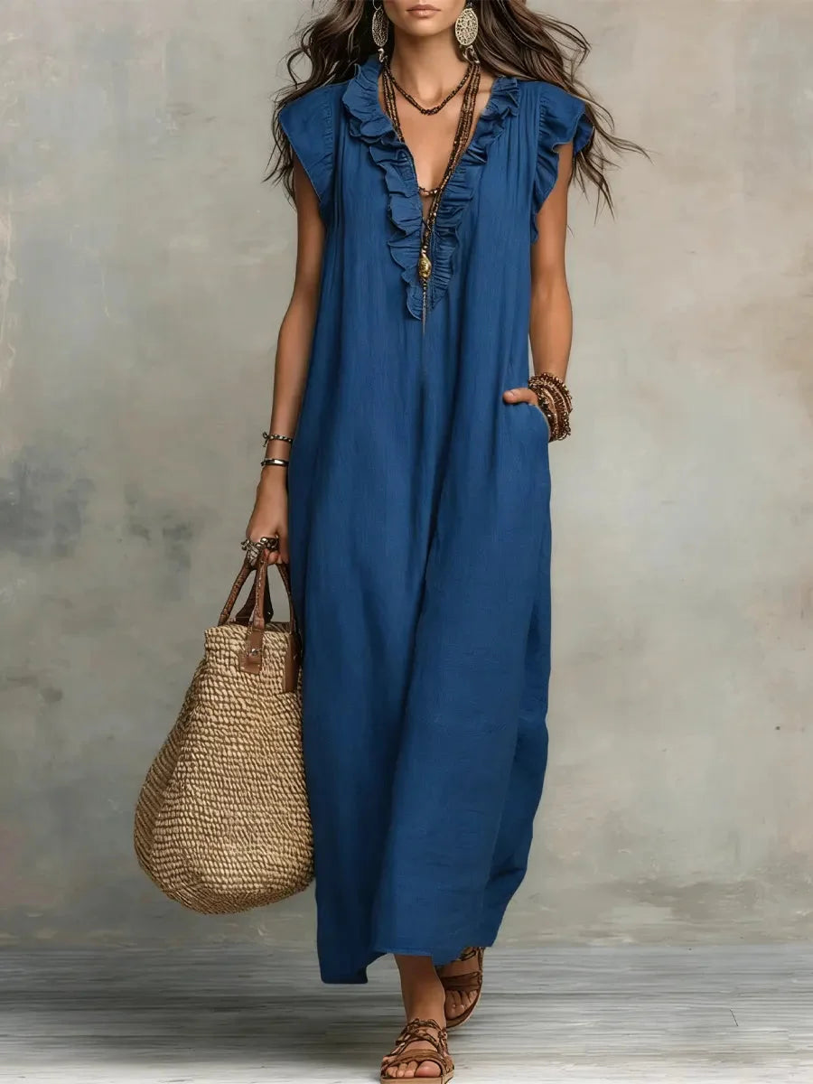 Elegant women's v-neck maxi dress with ruffles & pockets, ideal for comfortable vacation fashion.