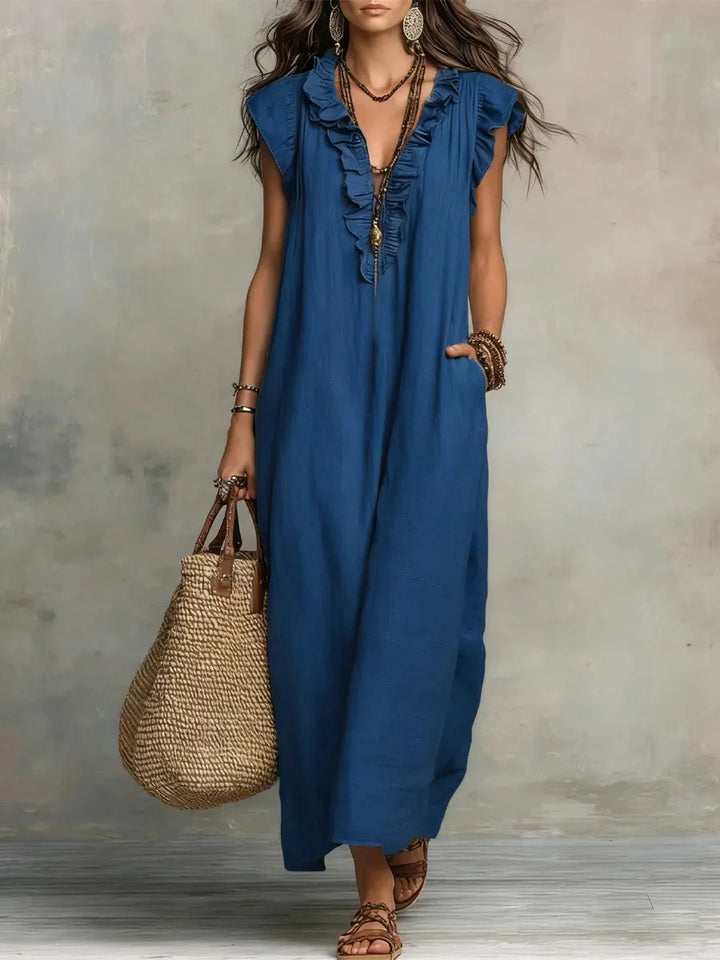 Elegant women's v-neck maxi dress with ruffles & pockets, ideal for comfortable vacation fashion.