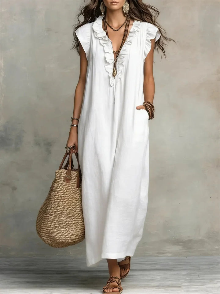Comfortable summer maxi dress: women's relaxed fit, ruffle details, convenient pockets for casual wear.