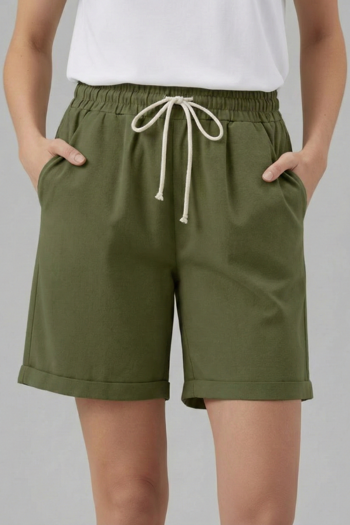 Effortlessly stylish and comfortable women's relaxed fit shorts with drawstring and pockets for easy wear.