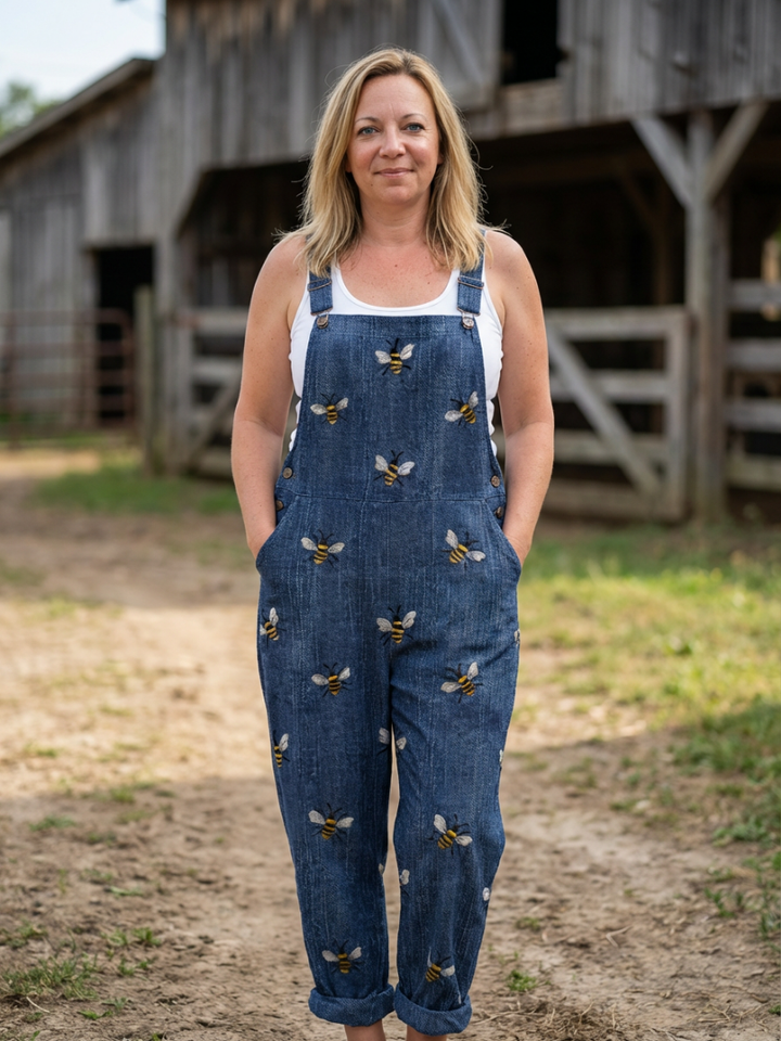 Women's relaxed fit strap jumpsuit with all-over print, perfect for casual summer wear.