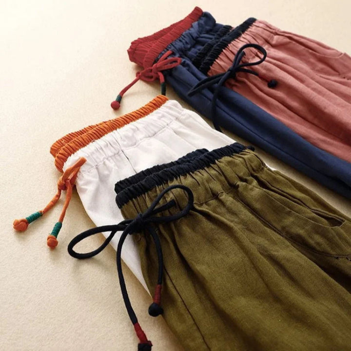 Flowy women's summer pants, relaxed fit & drawstring waist, perfect for everyday comfort or vacation fashion.