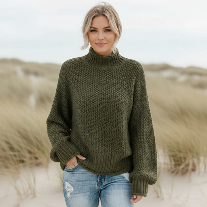 Cozy women's relaxed fit turtleneck sweater. Warm oversized pullover for ultimate comfort.