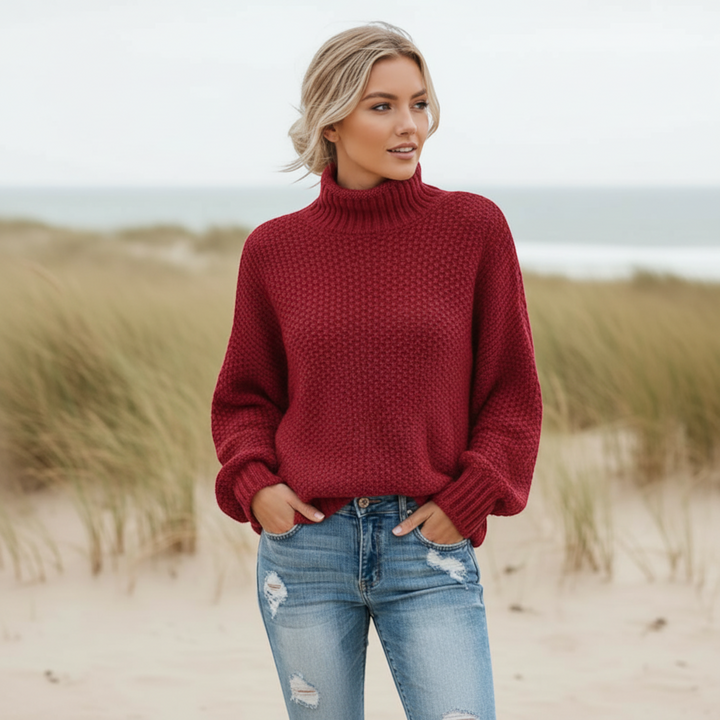Trendy women's relaxed fit turtleneck sweater. Cozy pullover, perfect for stylish winter outfits.