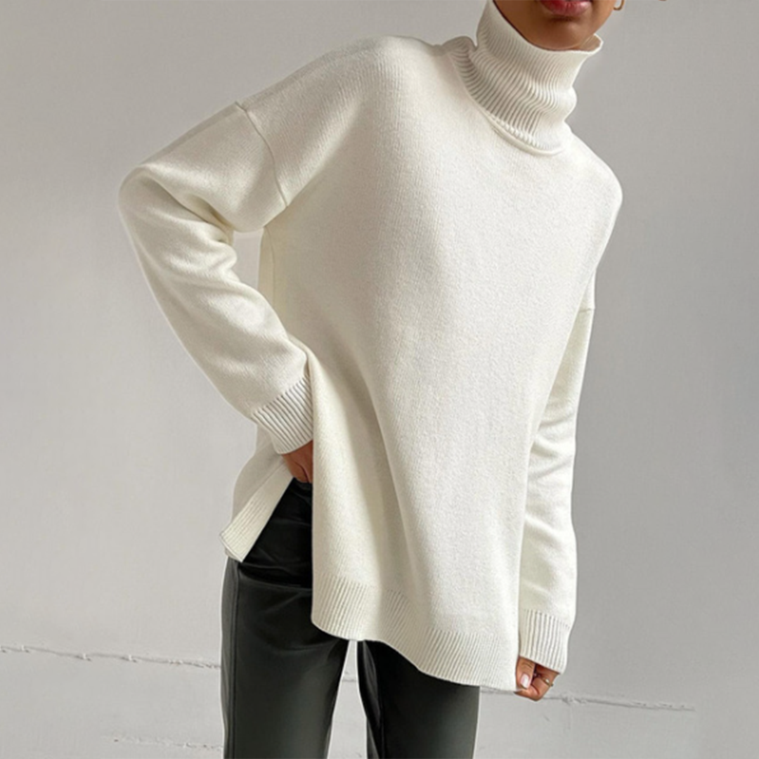 Women's relaxed fit turtleneck sweater. Pullover with modern side splits, perfect for casual elegant fall & winter fashion.