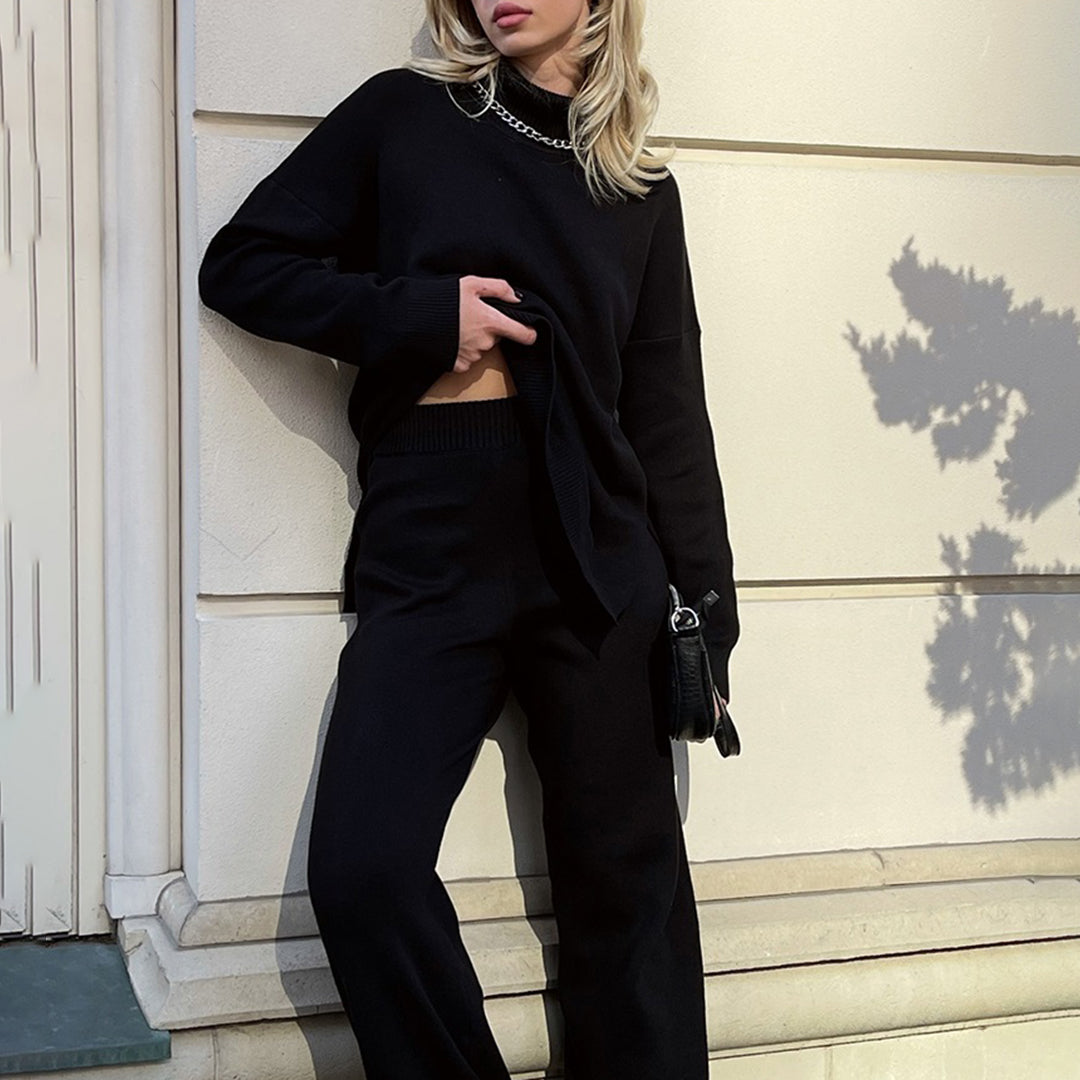Chic women's relaxed fit turtleneck sweater with elegant side split. A cozy long sleeve pullover for modern fall style.