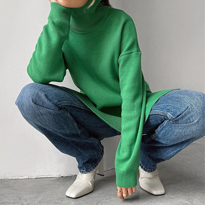 Casual elegant women's relaxed fit turtleneck sweater. Pullover with side split detail, perfect for everyday versatile wear.