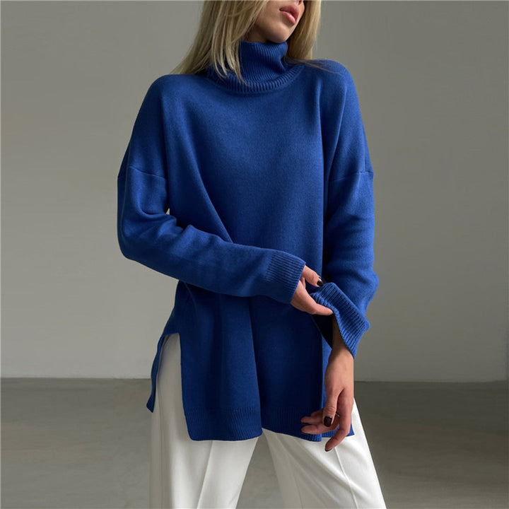 Women's long sleeve relaxed fit turtleneck sweater. Side split design makes this pullover a modern versatile top.