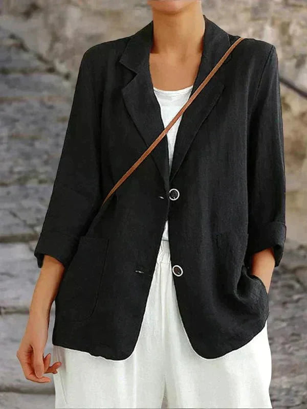 Versatile women's relaxed fit blazer, 3/4 sleeves, two-button closure. Ideal for casual chic layering.