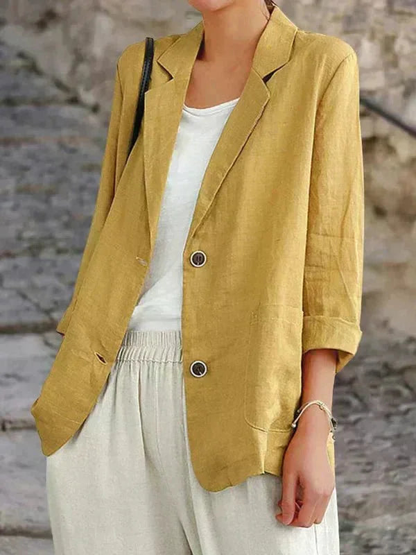 Chic women's relaxed fit 3/4 sleeve two-button blazer. Perfect for versatile smart casual & layering outfits.