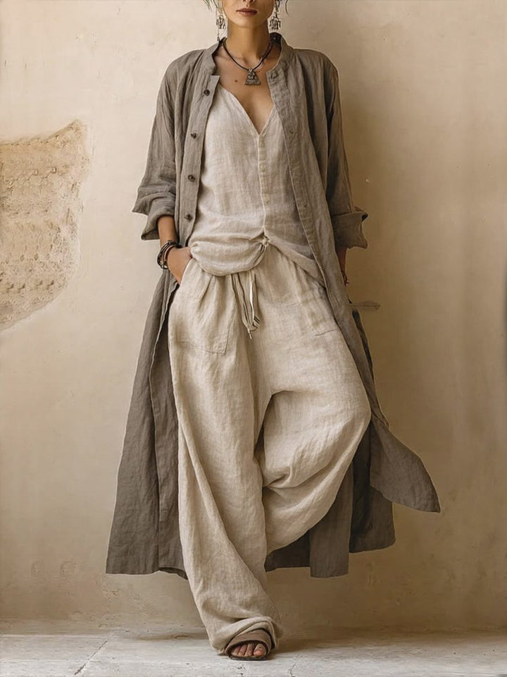 Women's relaxed fit two-piece set: oversized shirt & wide-leg pants in a neutral tone, perfect for casual summer wear.