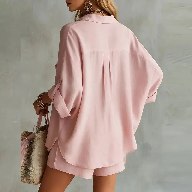 Stylish women's summer two-piece shirt & shorts set, ideal for casual outfits, vacations, and beach days.
