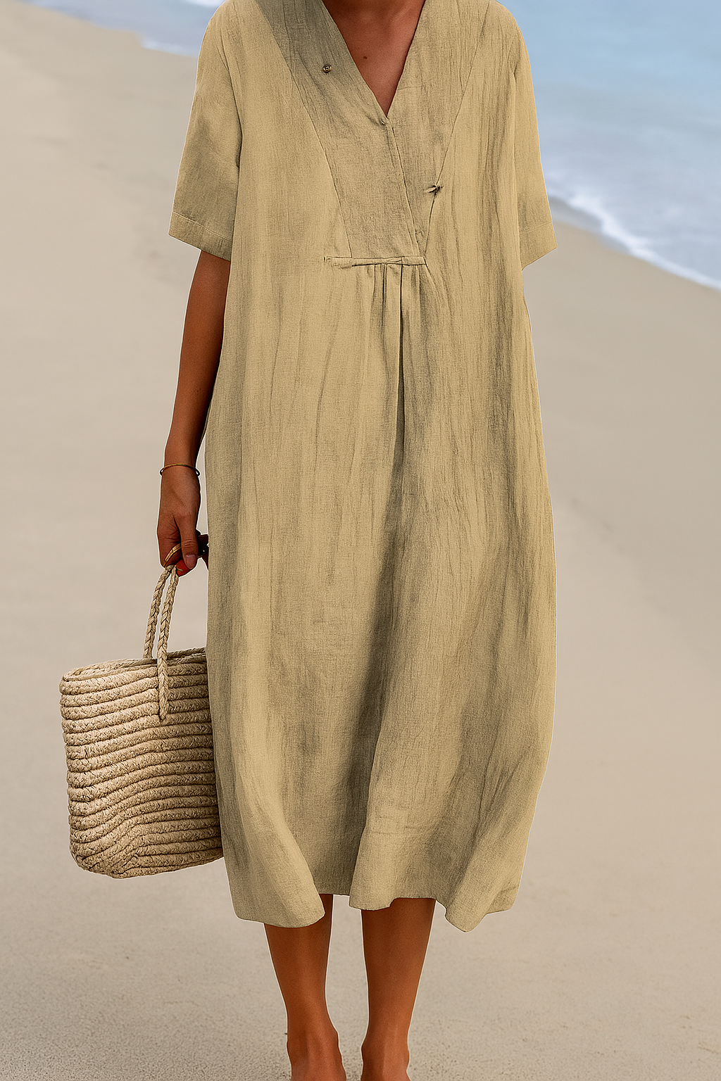 Stylish women's relaxed V-neck short sleeve dress, perfect for a summer beach look or casual resort style.