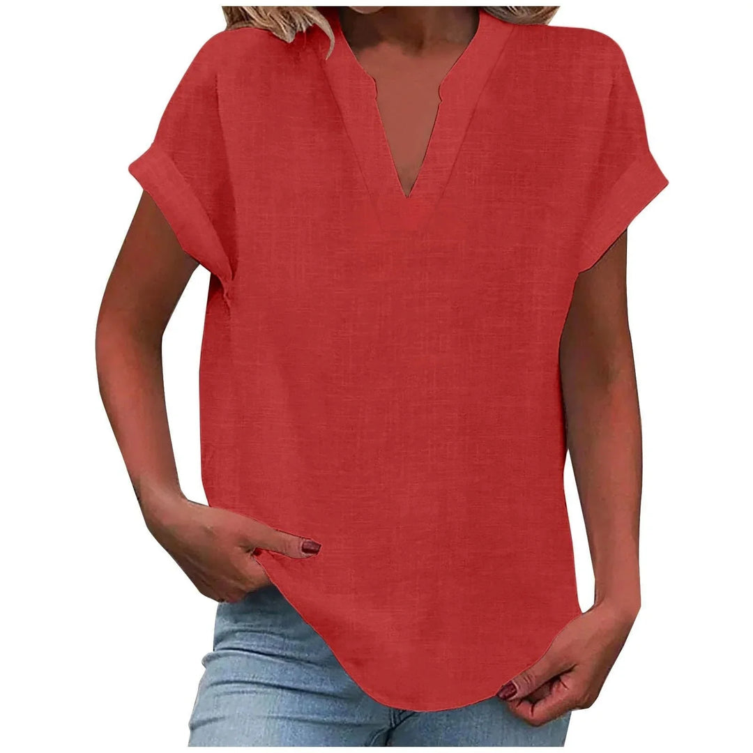 Versatile women's V-neck blouse, cuffed short sleeves, great for spring fashion and everyday wear.