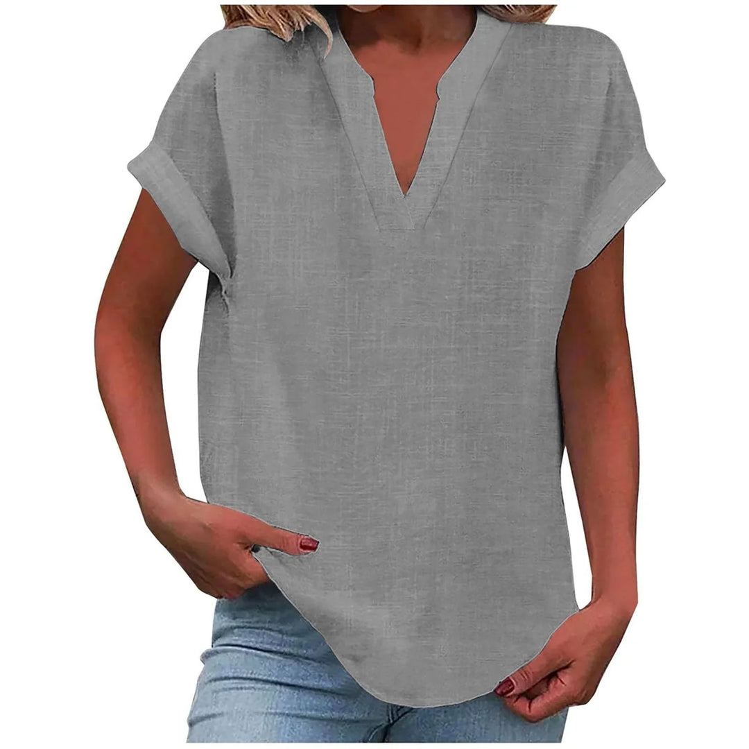 Stylish women's V-neck blouse with cuffed short sleeves, a relaxed fit top for any season.