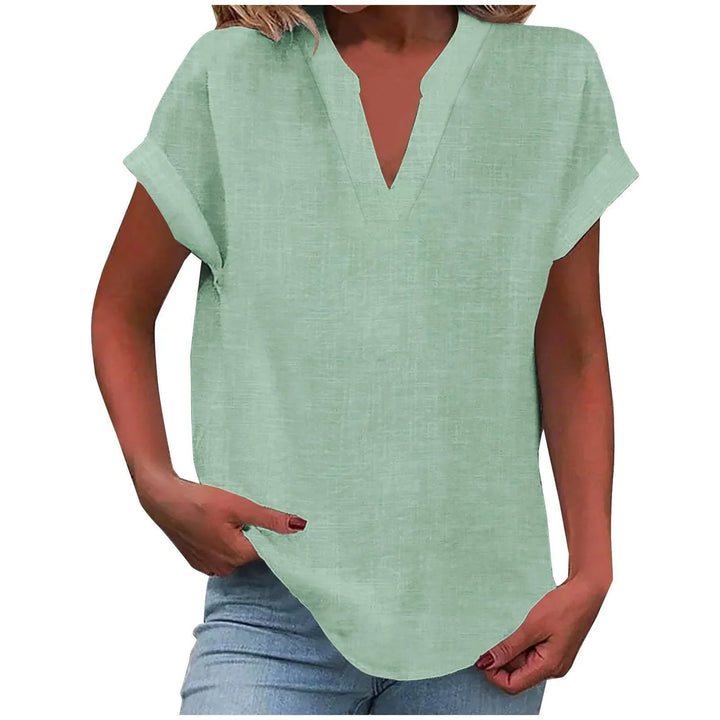 Comfortable women's relaxed V-neck blouse with cuffed short sleeves, a go-to for casual chic.