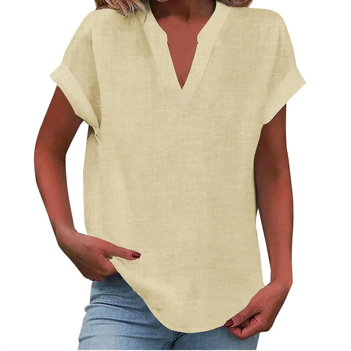 Effortlessly elegant women's V-neck blouse, short sleeves, relaxed fit, perfect for spring/summer.