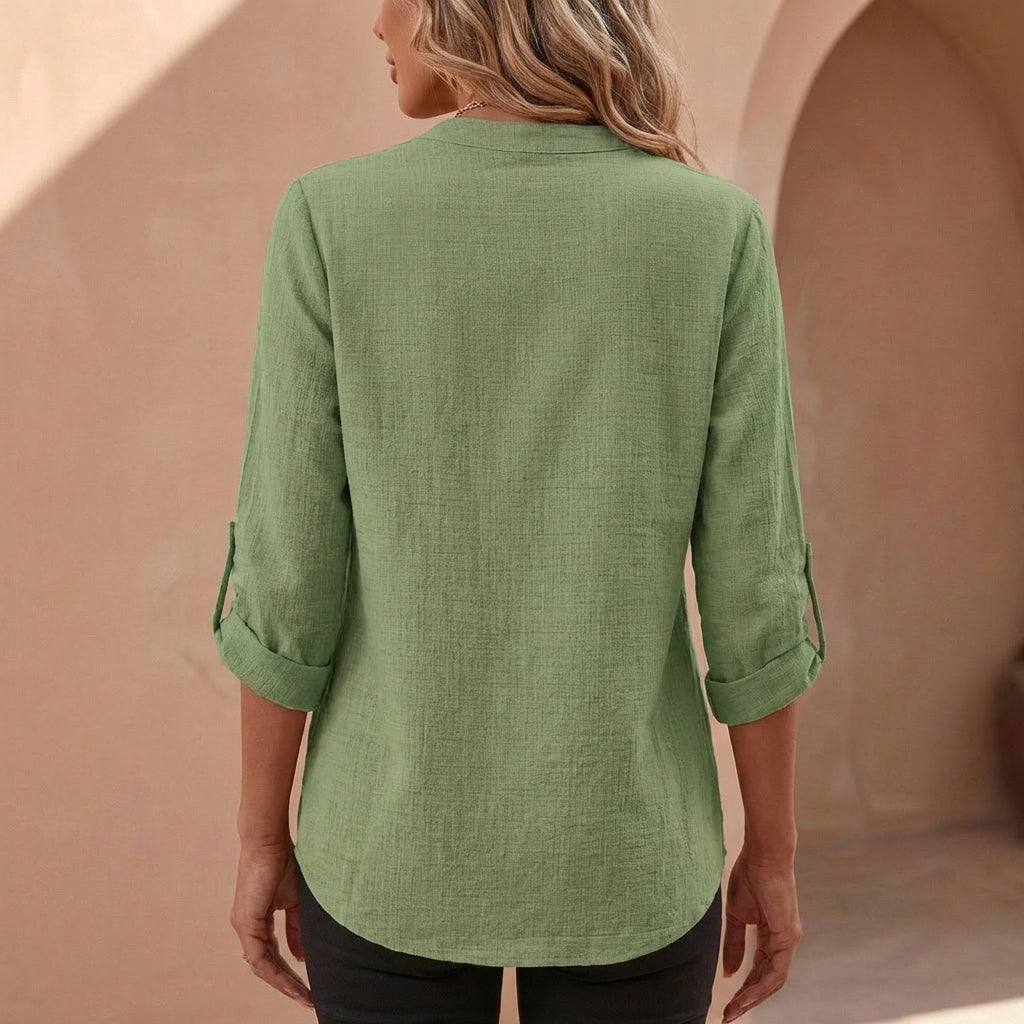 Elegant womens blouse with a unique band collar and flattering v-neck design