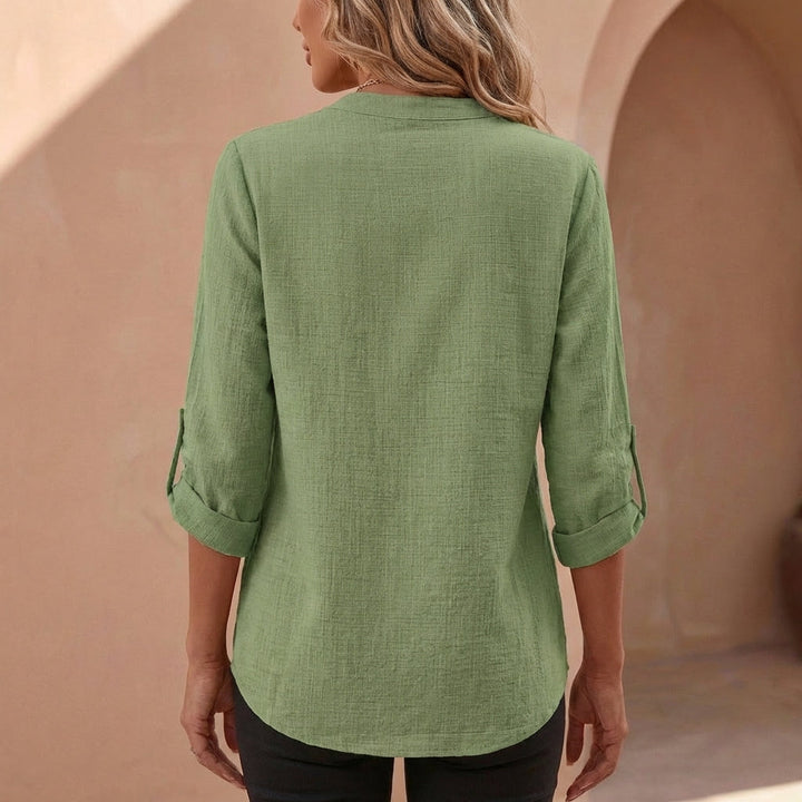 Elegant womens blouse with a unique band collar and flattering v-neck design