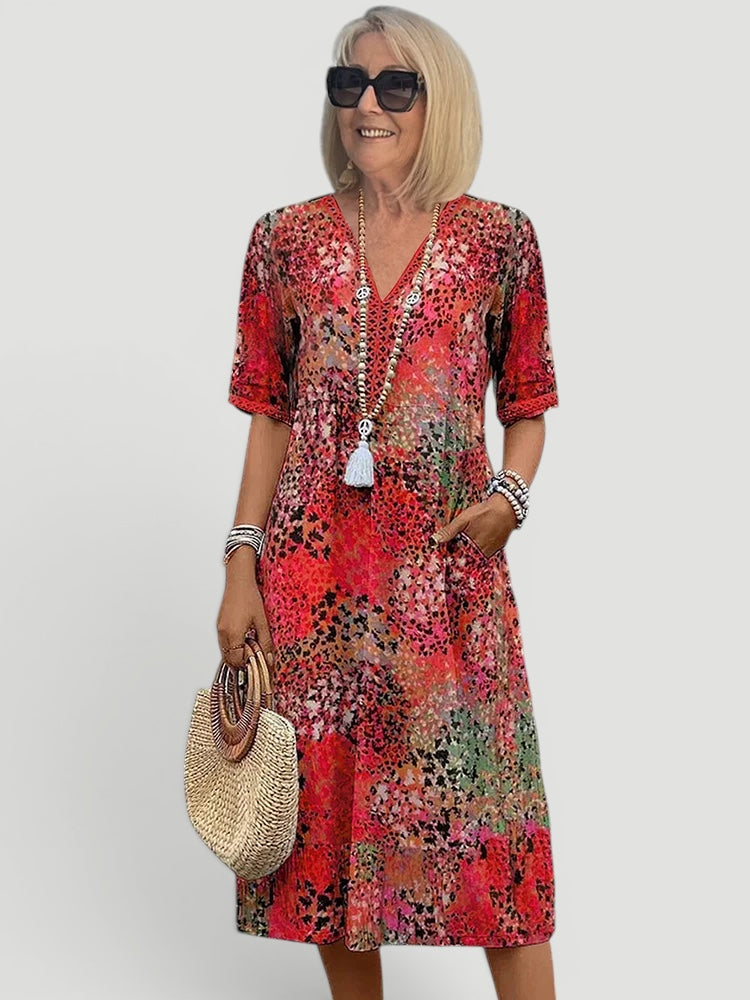 Elegant A-line women's midi dress with a V-neck. Relaxed fit, lightweight, and flowy for comfortable summer style.