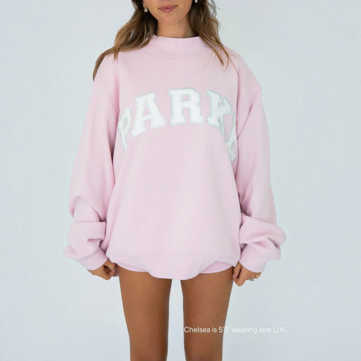 Collegiate women's relaxed fit hoodie, casual everyday pullover for comfort.