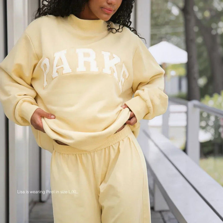 Women's varsity hoodie, relaxed fit for casual and comfortable everyday wear.