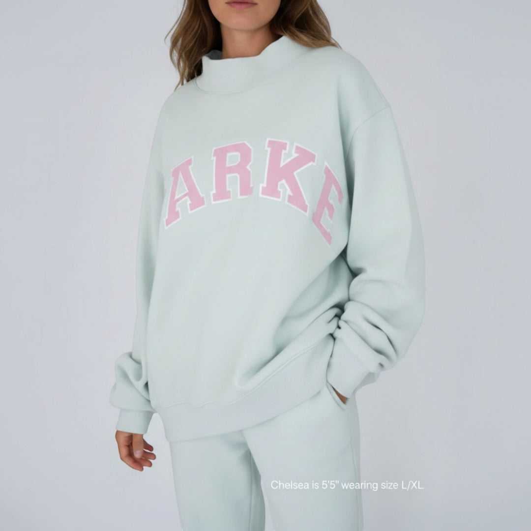 Long sleeve women's varsity sweater, perfect relaxed fit comfort for daily style.