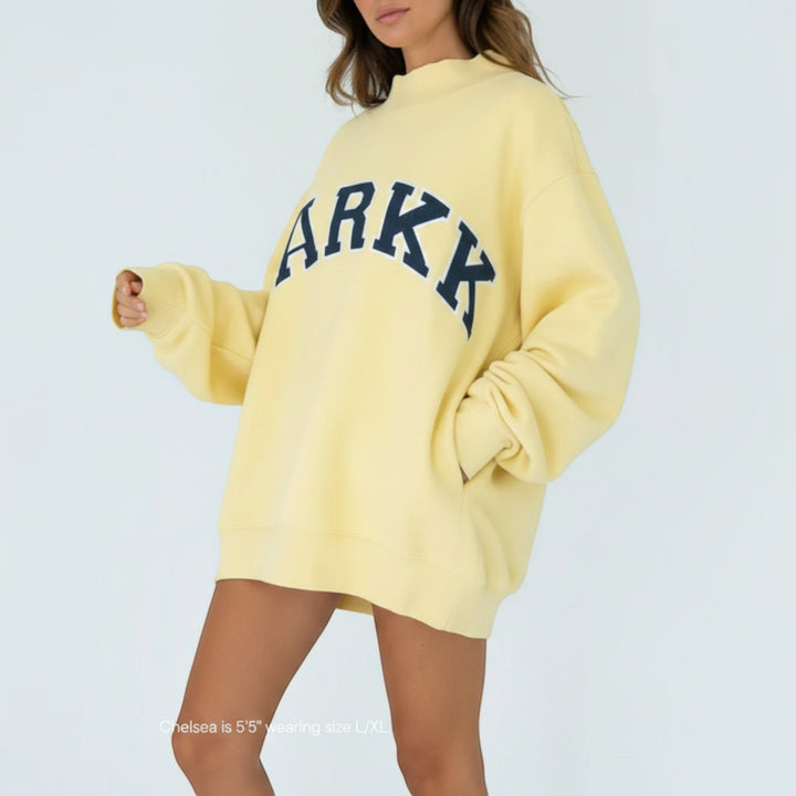 Women's collegiate varsity hoodie, comfortable oversized pullover for casual wear.