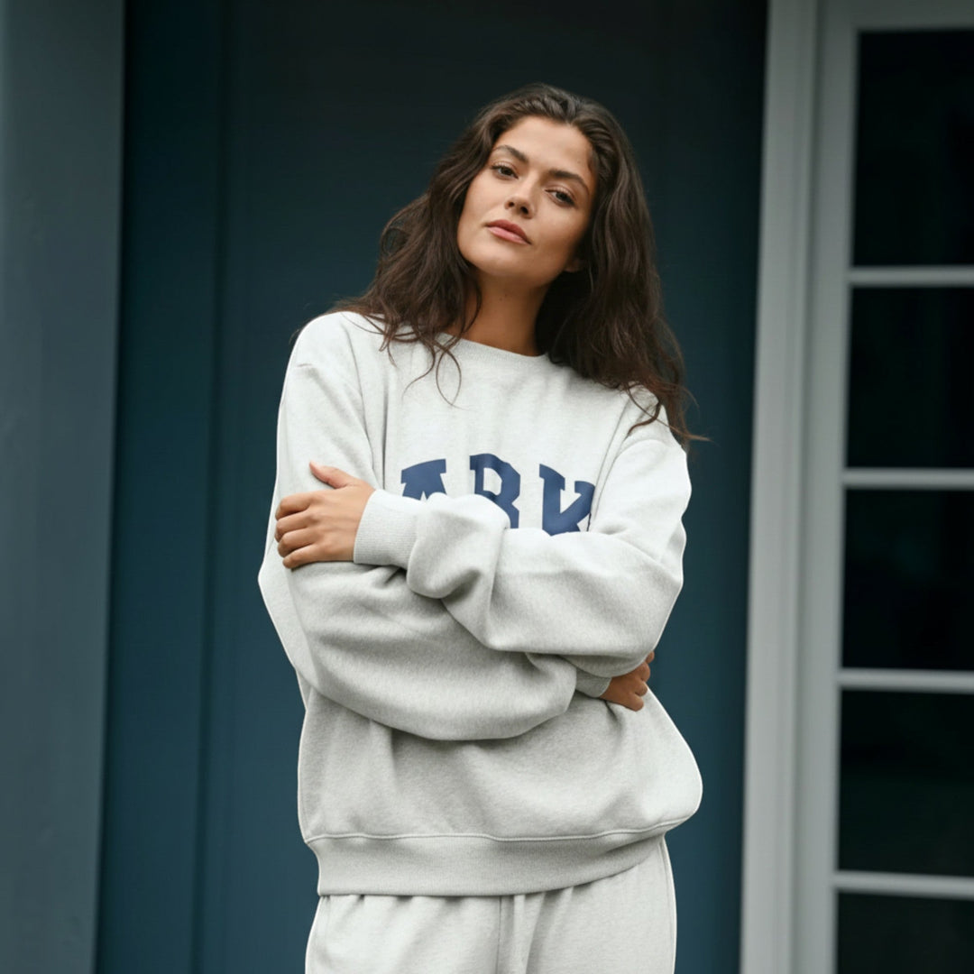 Collegiate everyday comfort women's hoodie, relaxed fit sweater for style.