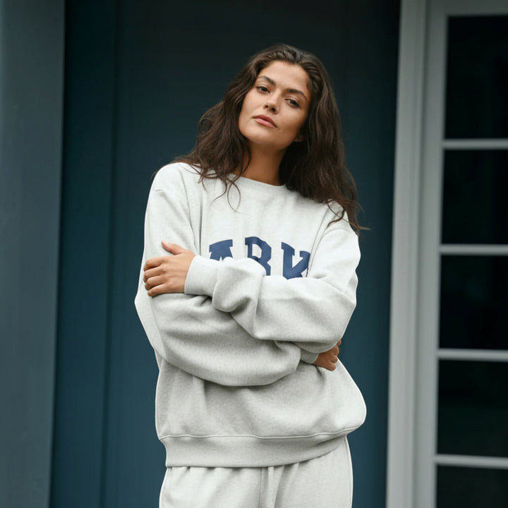 Collegiate everyday comfort women's hoodie, relaxed fit sweater for style.