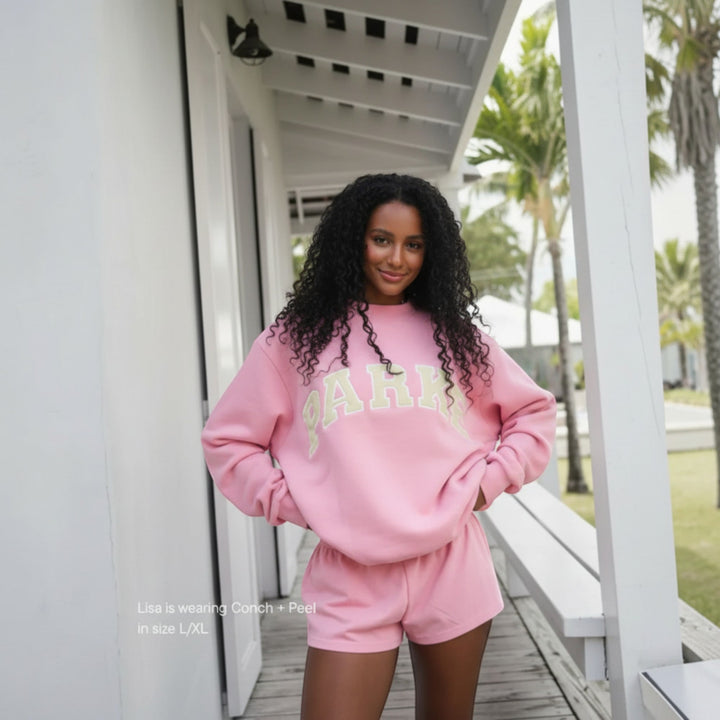 Women's varsity hoodie, relaxed fit for stylish casual fashion & comfort.