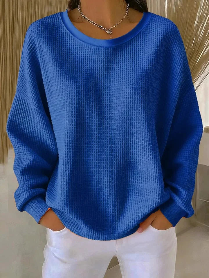 Versatile long sleeve waffle knit sweater for women. Relaxed fit, ideal for casual and everyday fashion.