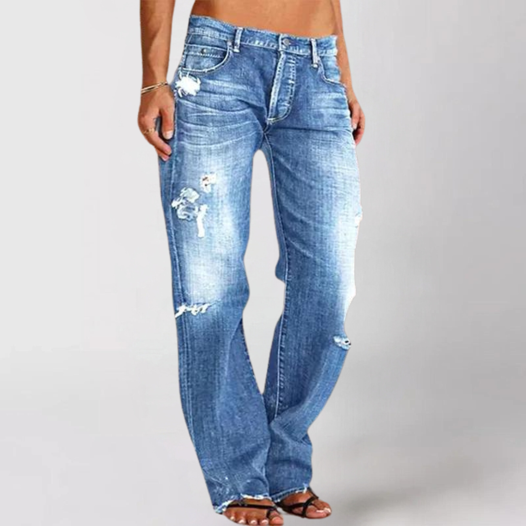Women's relaxed fit wide-leg denim jeans in a light wash, perfect for casual everyday comfort and effortless style.