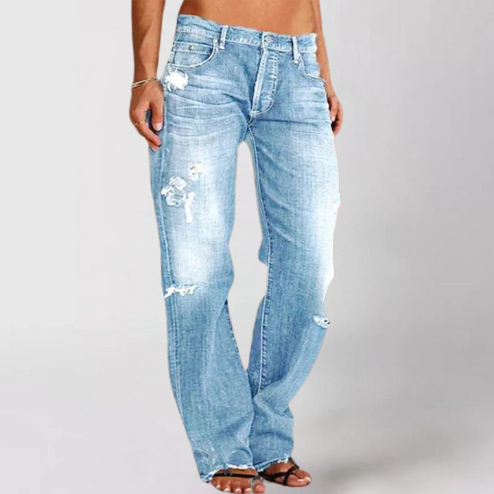 Light wash women's relaxed wide-leg denim jeans, offering ultimate comfort and a fashionable, laid-back casual style.