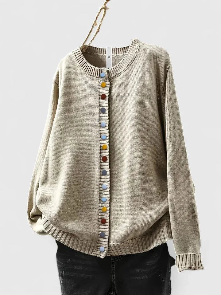 Women's relaxed knit cardigan sweater with unique multi-color buttons. Comfortable & chic layering knitwear.