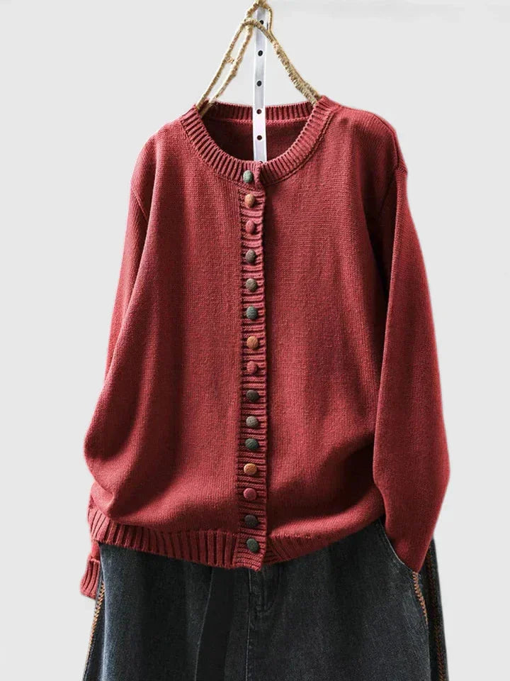 Soft & cozy women's relaxed fit knit cardigan sweater with distinctive multi-color buttons. Chic casual style.