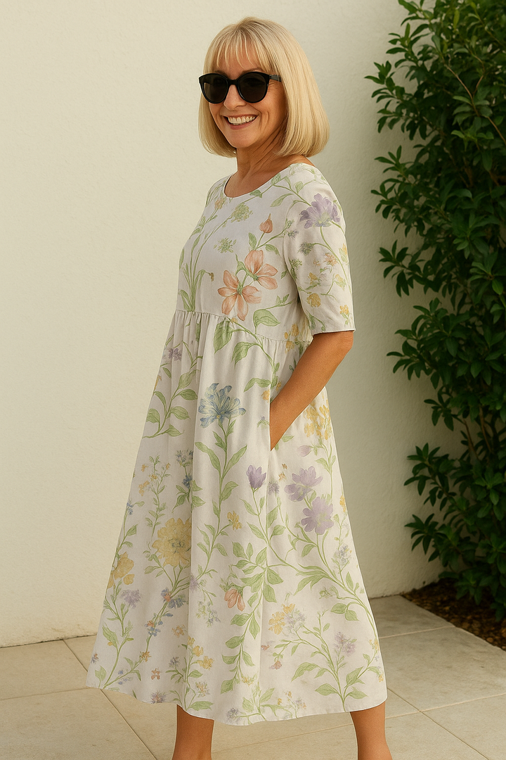 Effortless comfort: Women's relaxed fit midi dress, 3/4 sleeves, perfect navy blue for casual spring days.