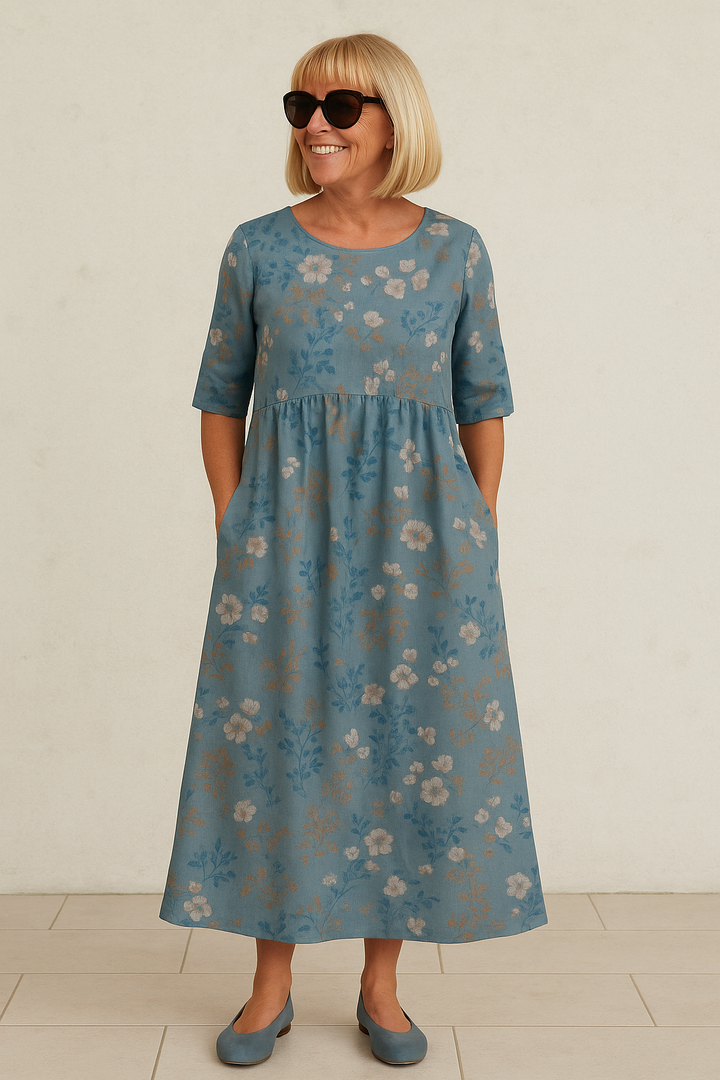 Elegant women's midi dress, relaxed fit with 3/4 sleeves, ideal for comfortable spring & summer everyday wear.